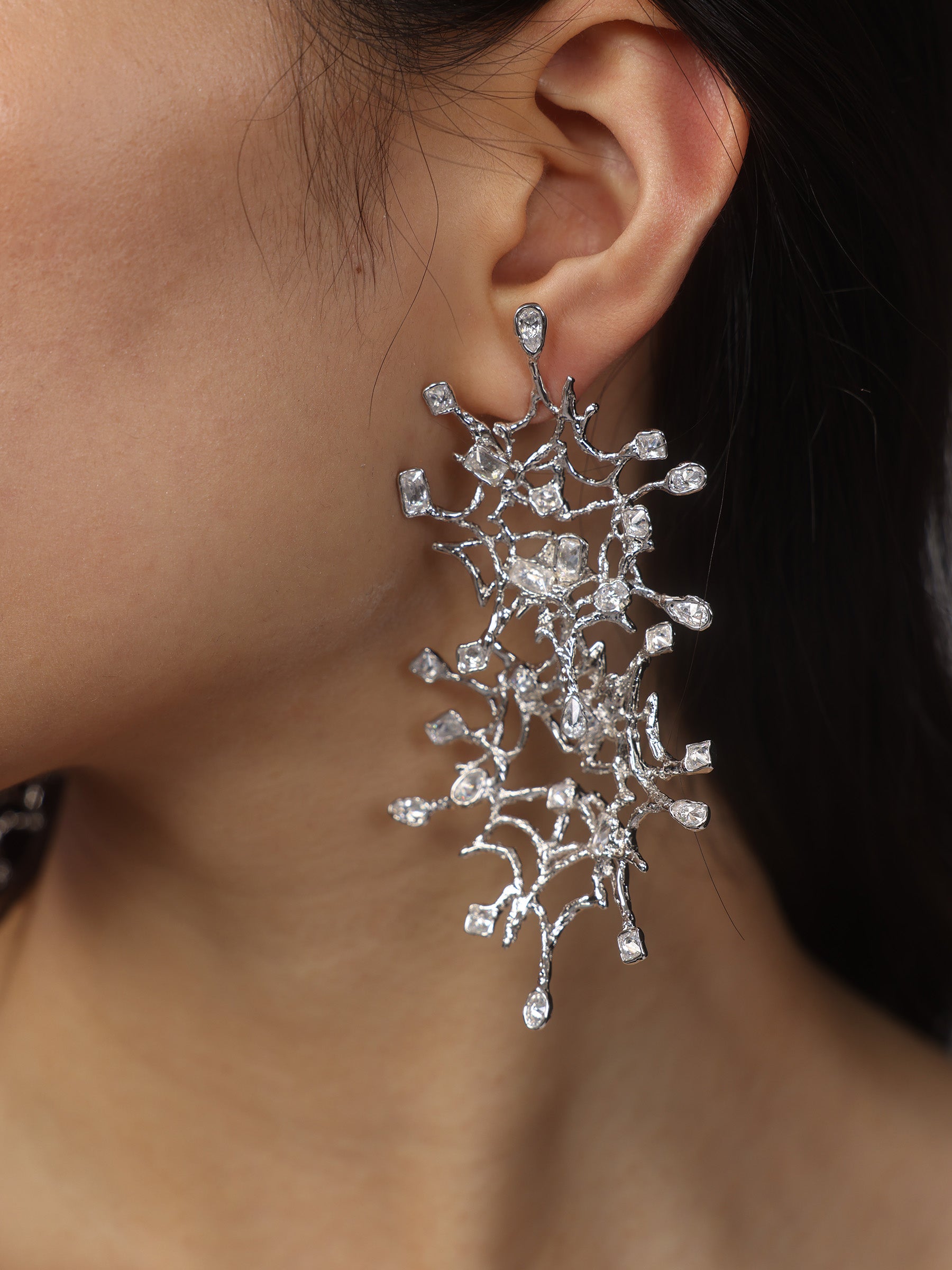 Oversized starfish-shaped firework earrings