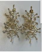 Oversized starfish-shaped firework earrings