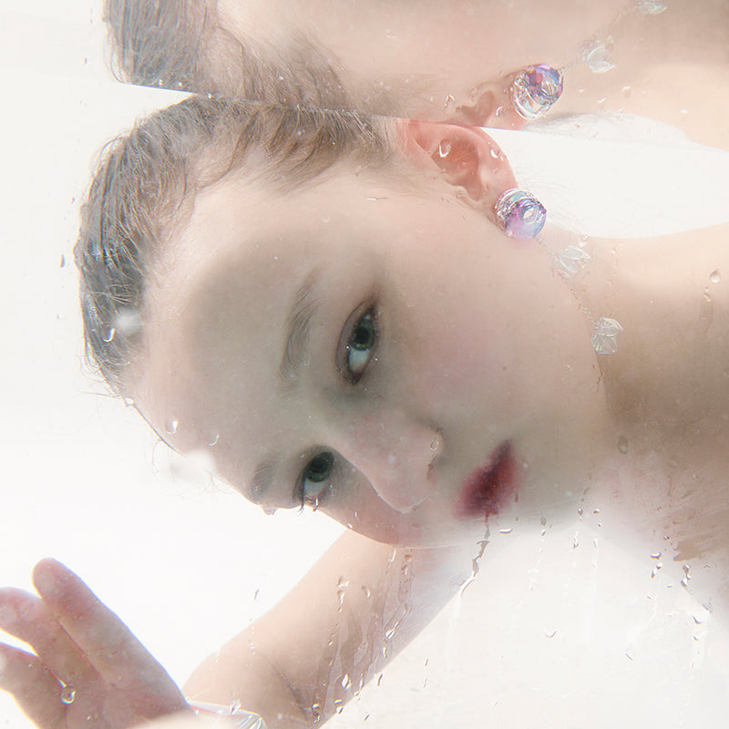 Asymmetrical crystal earrings for aquarium enthusiasts