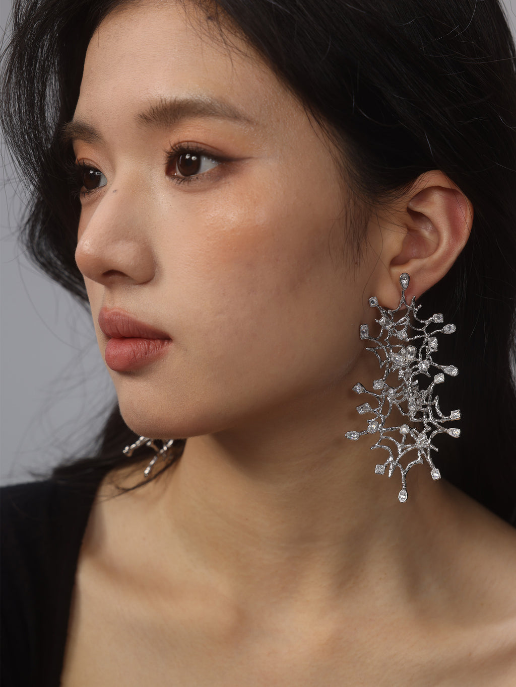 Oversized starfish-shaped firework earrings