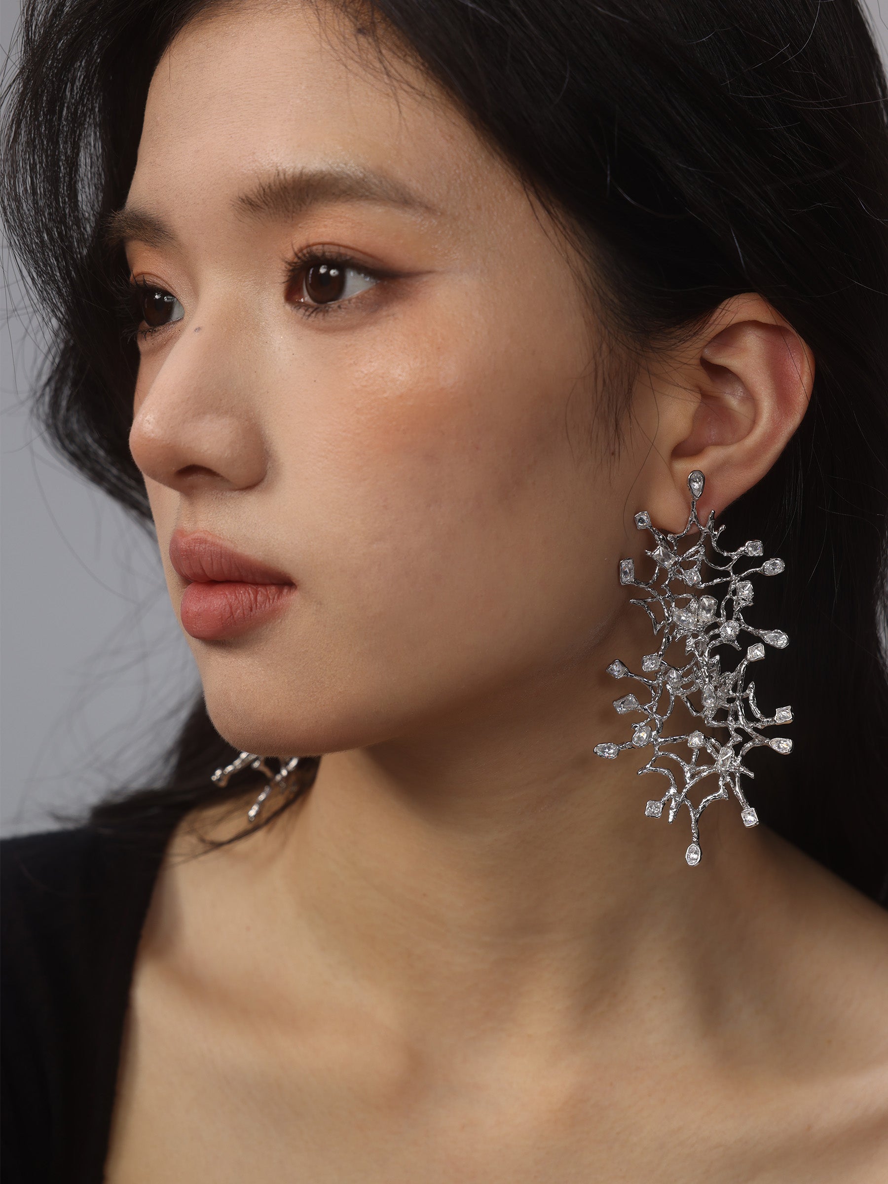 Oversized starfish-shaped firework earrings